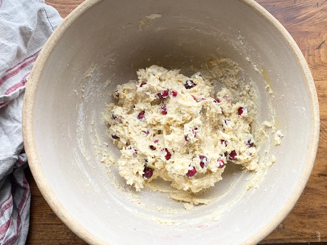 Gluten Free Cranberry Orange Scone Mixture In Tan Bowl