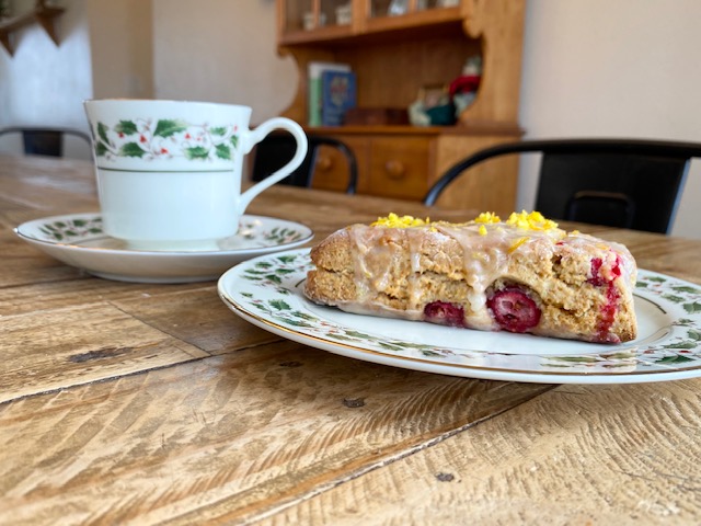 Gluten Free Cranberry Orange Scones On Christmas Plate With Coffee 